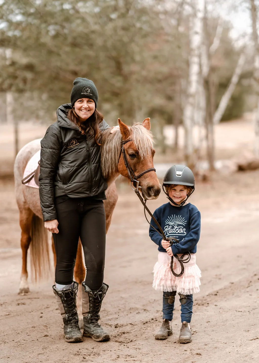 Kelly with a young rider and her pony